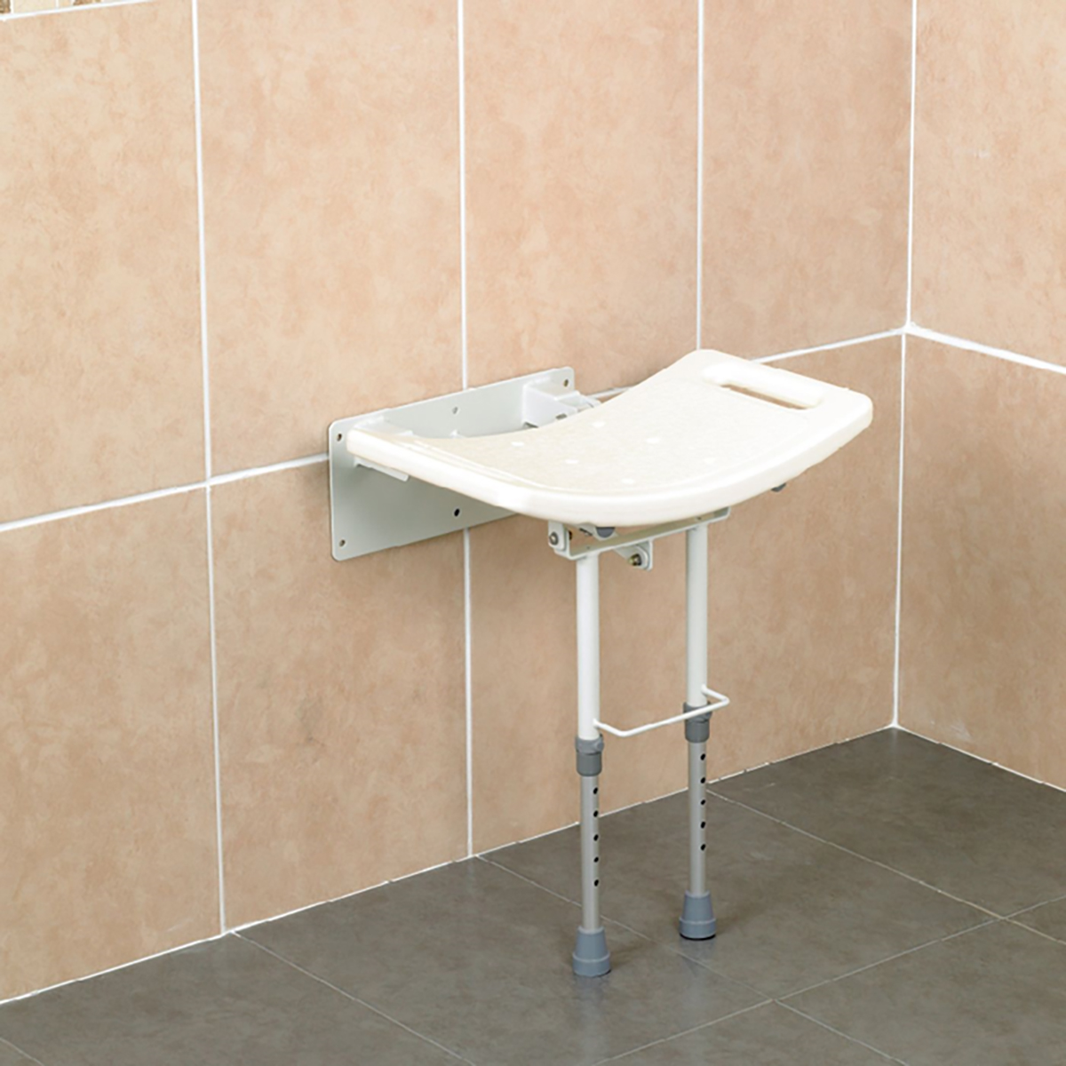 A white Wall Mounted Shower Seat with aluminium legs situated in a shower Legs